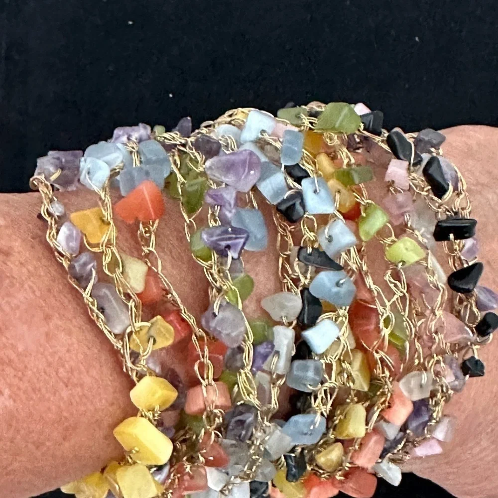 SALE: Bracelet Multi-colored natural stones strung on gold woven wire. 4” wide